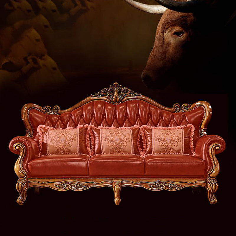 Sofá de brazo acampanado con asiento dividido tradicional con mechones adornados con almohadas en marrón