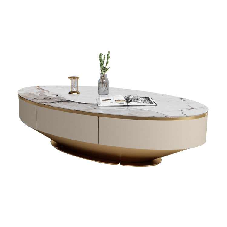 Tavolino da caffè a base di piedistallo glam con top in pietra e base in metallo