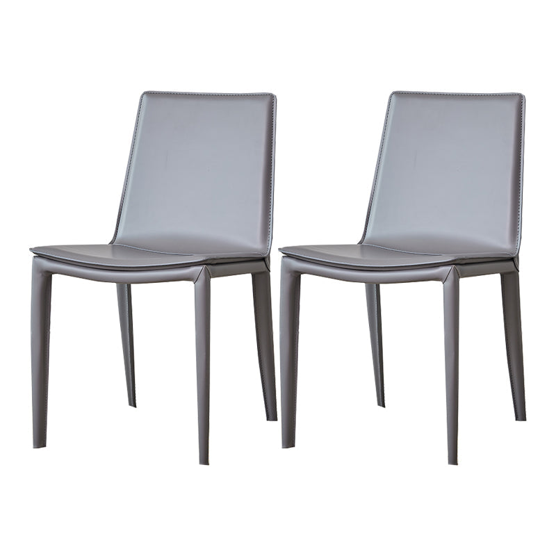 モダンなシンプルなサイドチェアフェイクレザー自宅で使用するためのカラフルなアームレスダイニングチェア
