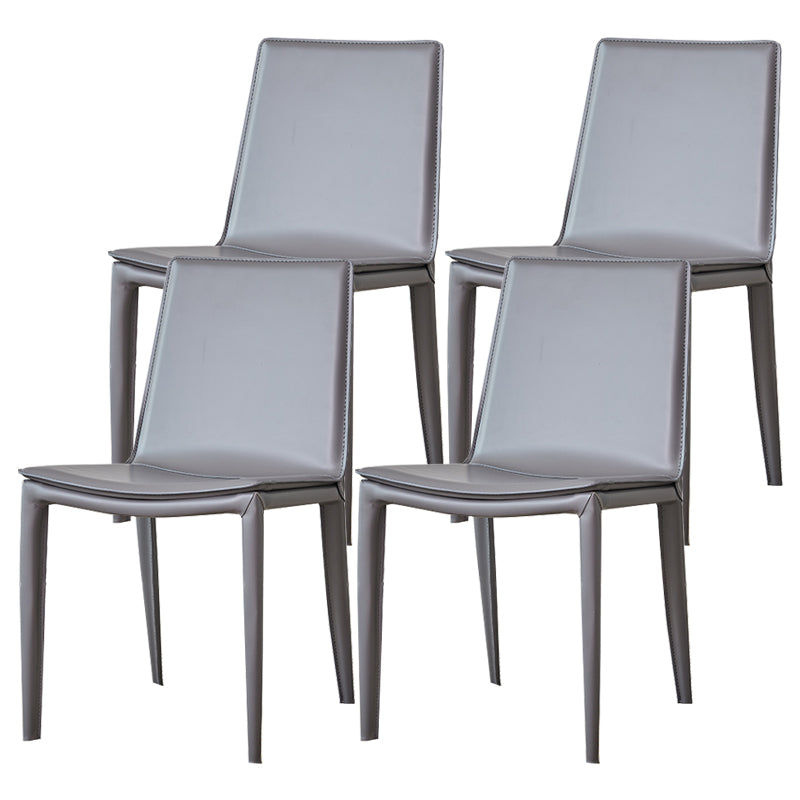 モダンなシンプルなサイドチェアフェイクレザー自宅で使用するためのカラフルなアームレスダイニングチェア