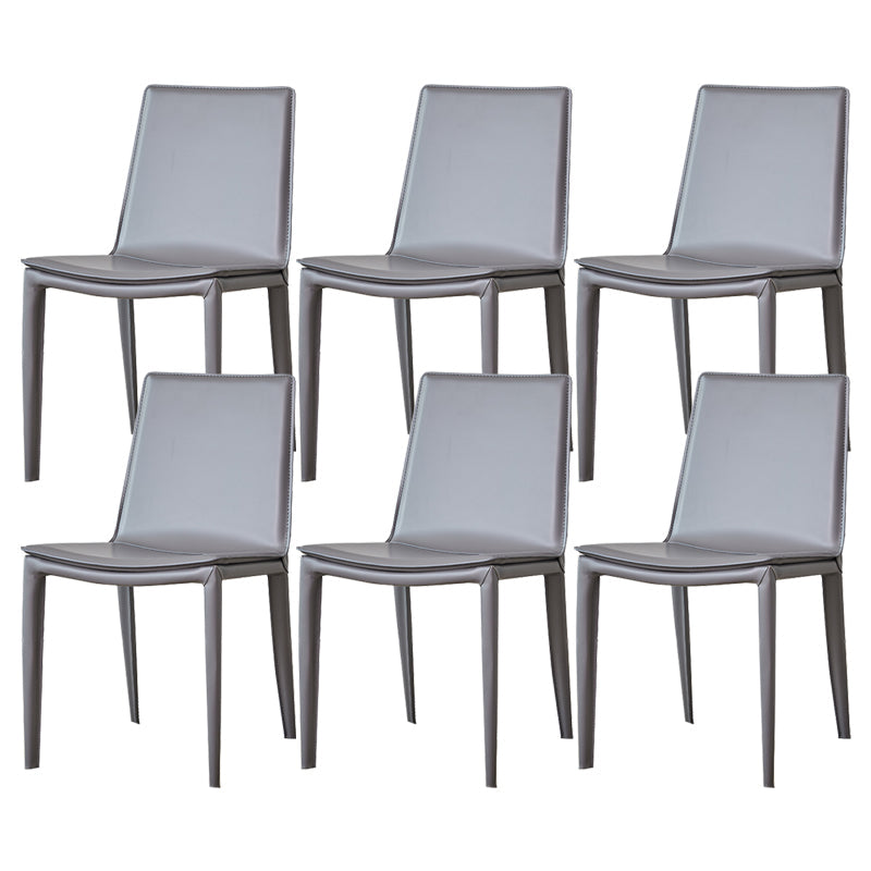 モダンなシンプルなサイドチェアフェイクレザー自宅で使用するためのカラフルなアームレスダイニングチェア