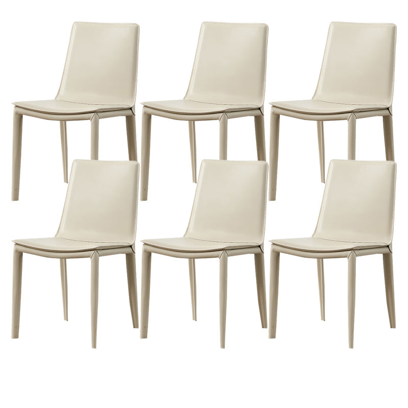 モダンなシンプルなサイドチェアフェイクレザー自宅で使用するためのカラフルなアームレスダイニングチェア