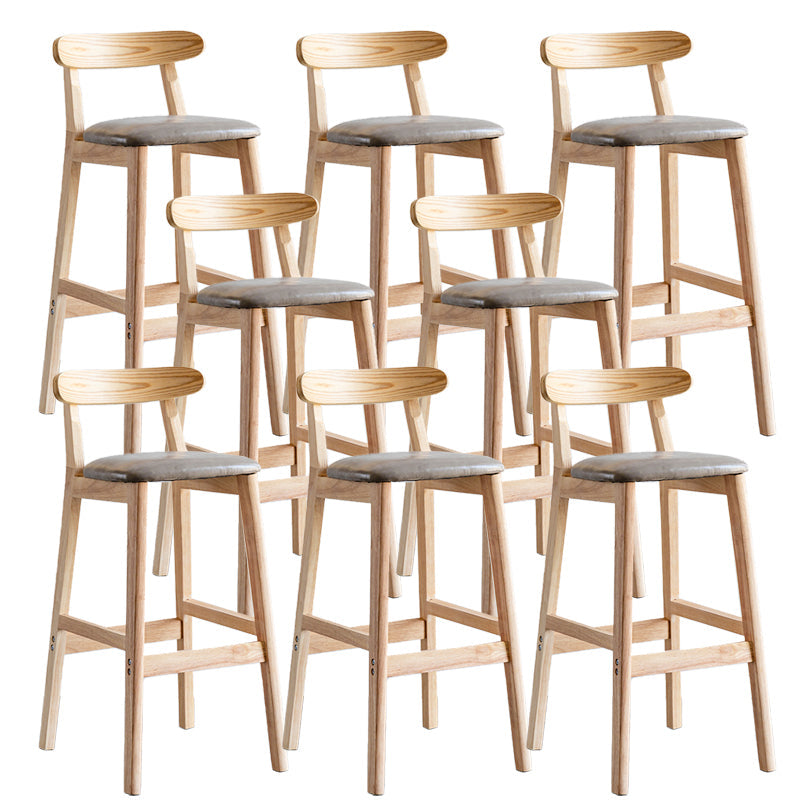 Pie de contraataque industrial Taburete de Counterless Café de madera con pedal y cojín