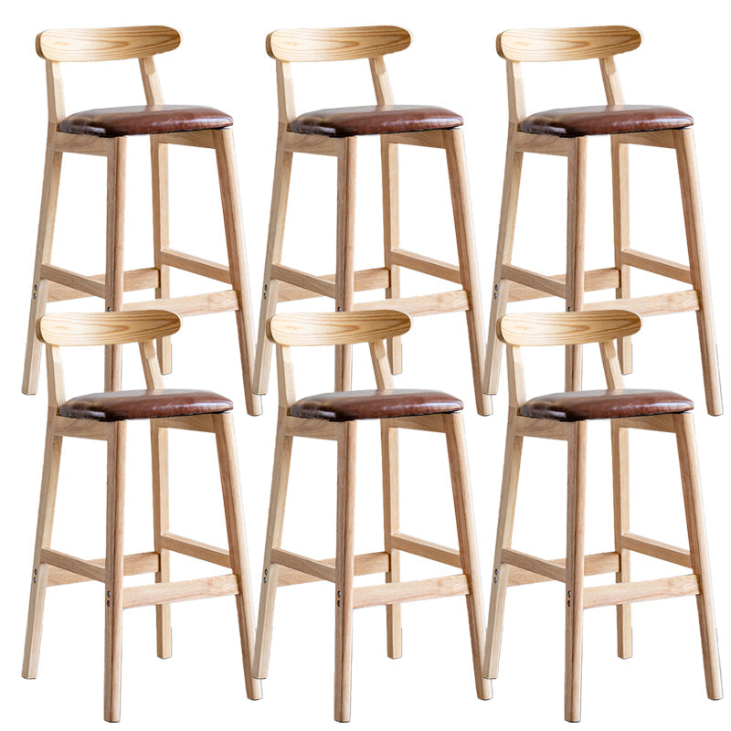 Pie de contraataque industrial Taburete de Counterless Café de madera con pedal y cojín