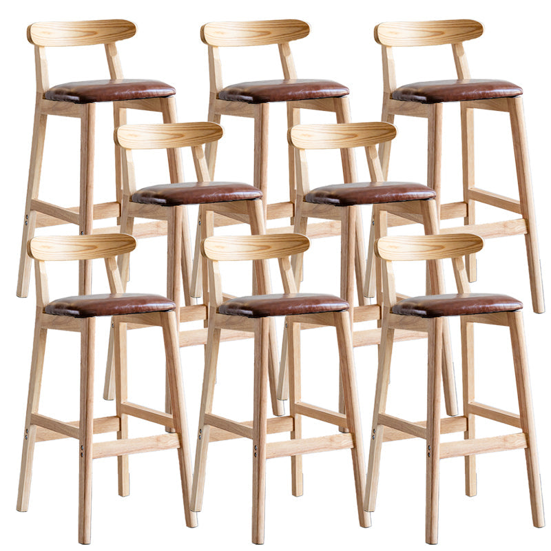 Pie de contraataque industrial Taburete de Counterless Café de madera con pedal y cojín