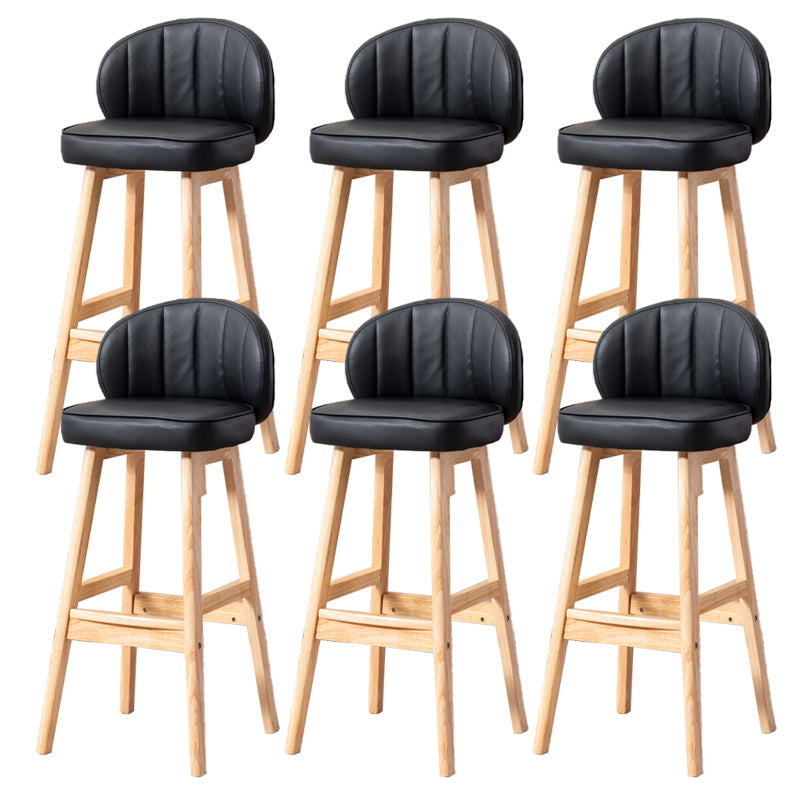 Sgabelli da bar in legno massiccio industriale PU Schibelli in pelle con parte bassa