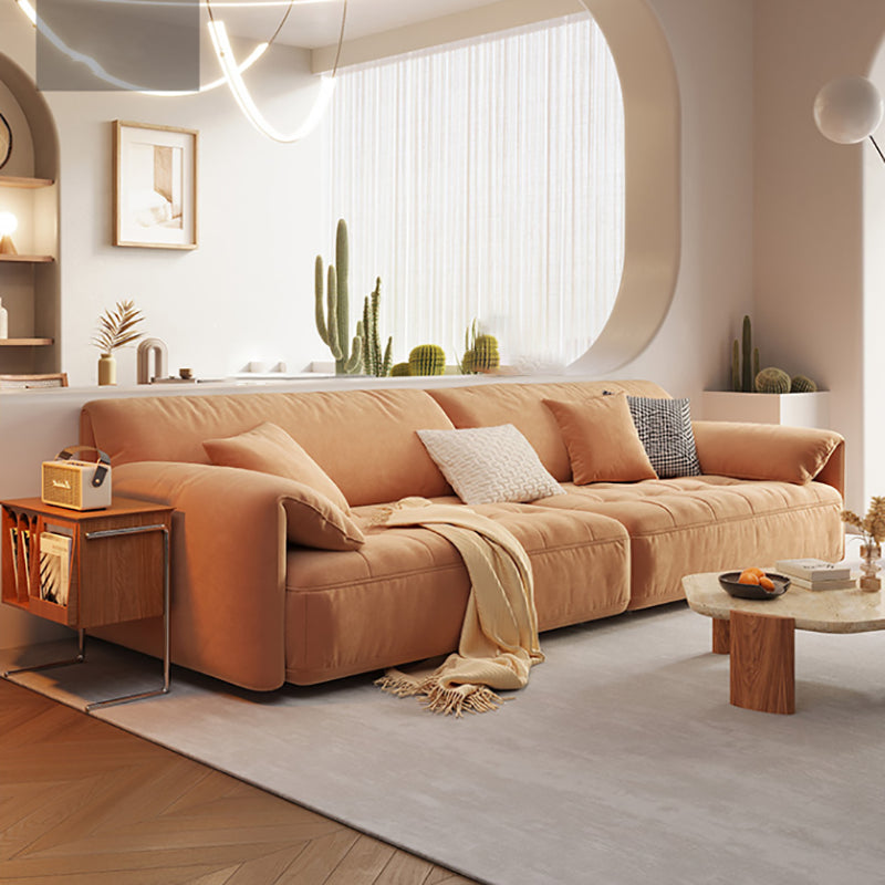 Sofá seccional con brazo superior tipo almohada en madera maciza con respaldo acolchado