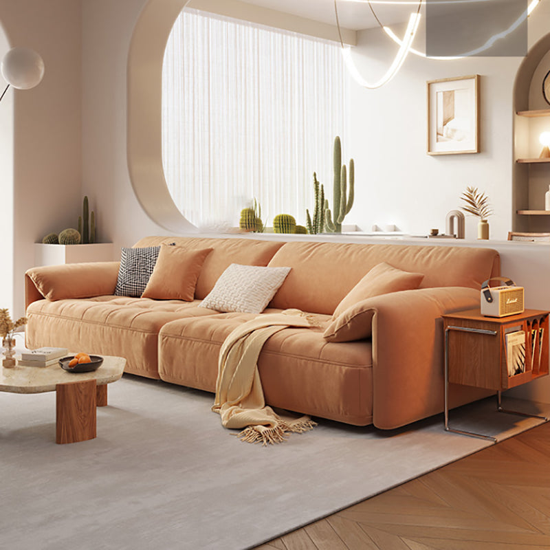Sofá seccional con brazo superior tipo almohada en madera maciza con respaldo acolchado