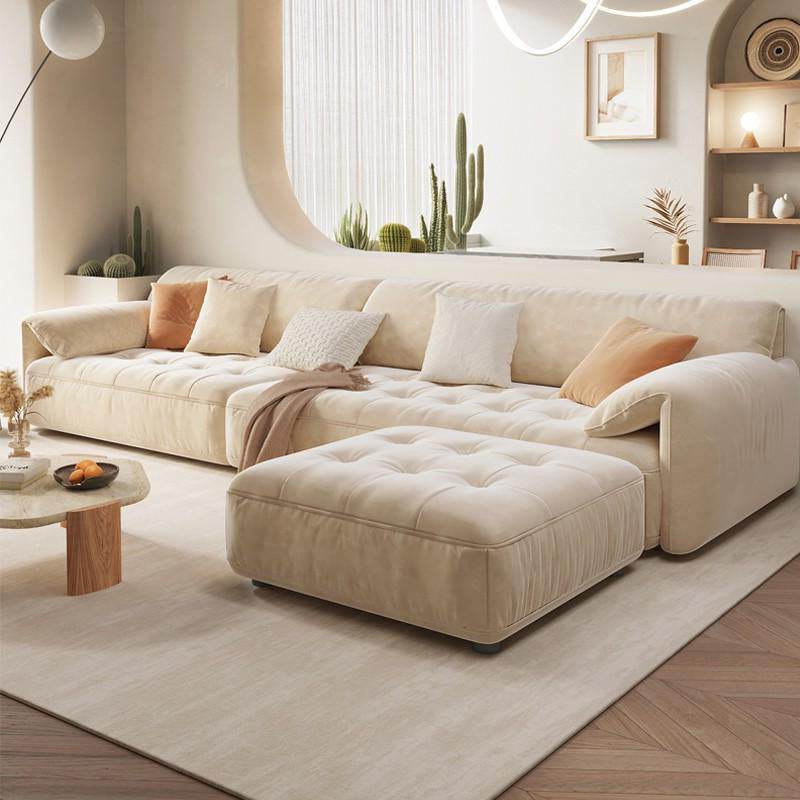 Sofá seccional con brazo superior tipo almohada en madera maciza con respaldo acolchado