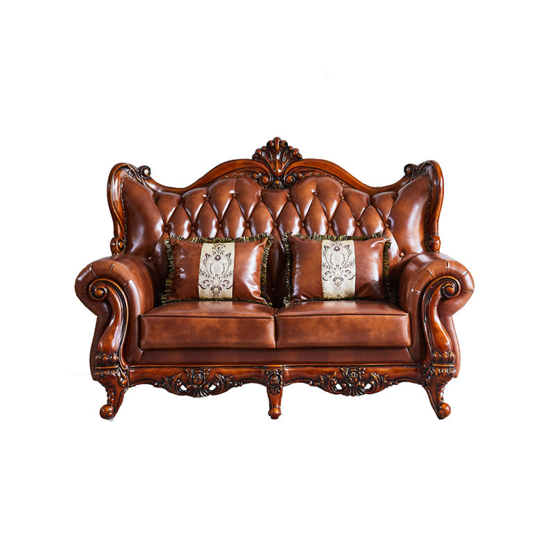 茶色の枕が付いた伝統的な房状のスプリットバック座席フレアアームソファ