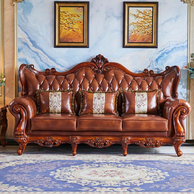 茶色の枕が付いた伝統的な房状のスプリットバック座席フレアアームソファ