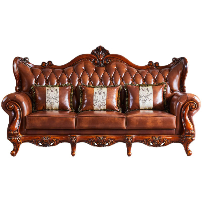 茶色の枕が付いた伝統的な房状のスプリットバック座席フレアアームソファ