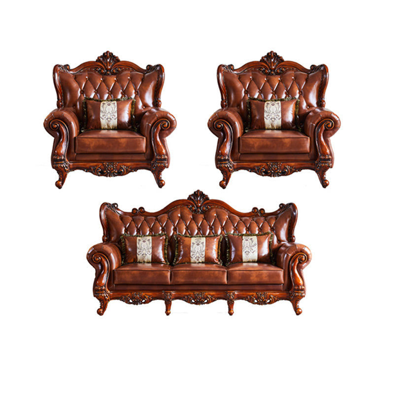 茶色の枕が付いた伝統的な房状のスプリットバック座席フレアアームソファ