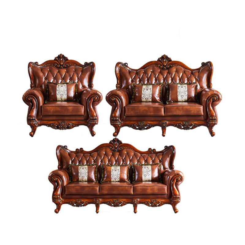 茶色の枕が付いた伝統的な房状のスプリットバック座席フレアアームソファ