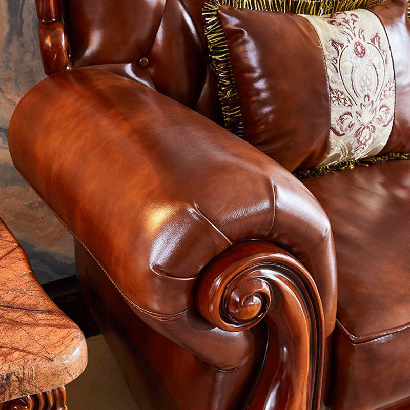 茶色の枕が付いた伝統的な房状のスプリットバック座席フレアアームソファ