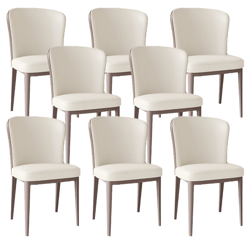 Moderne eenvoudige zijstoel faux lederen eetkamerstoel met metalen basis voor huisgebruik