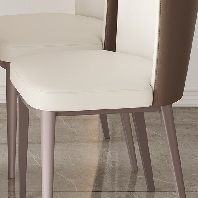 Moderne eenvoudige zijstoel faux lederen eetkamerstoel met metalen basis voor huisgebruik