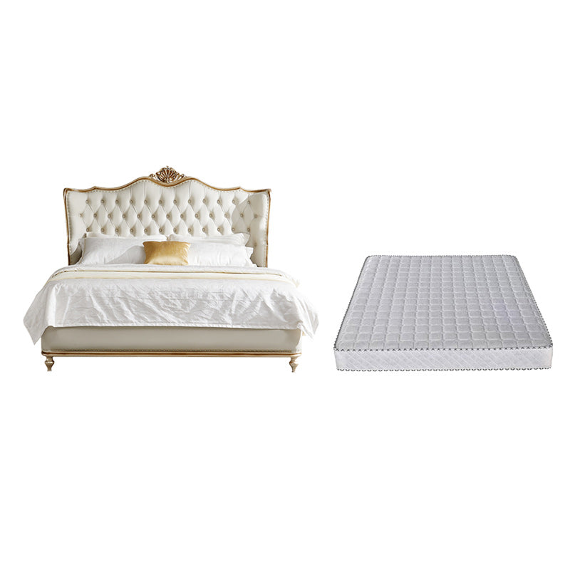 Eigentijds wit bed met gestoffeerd hoofdeinde in Victoriaanse stijl leerhout