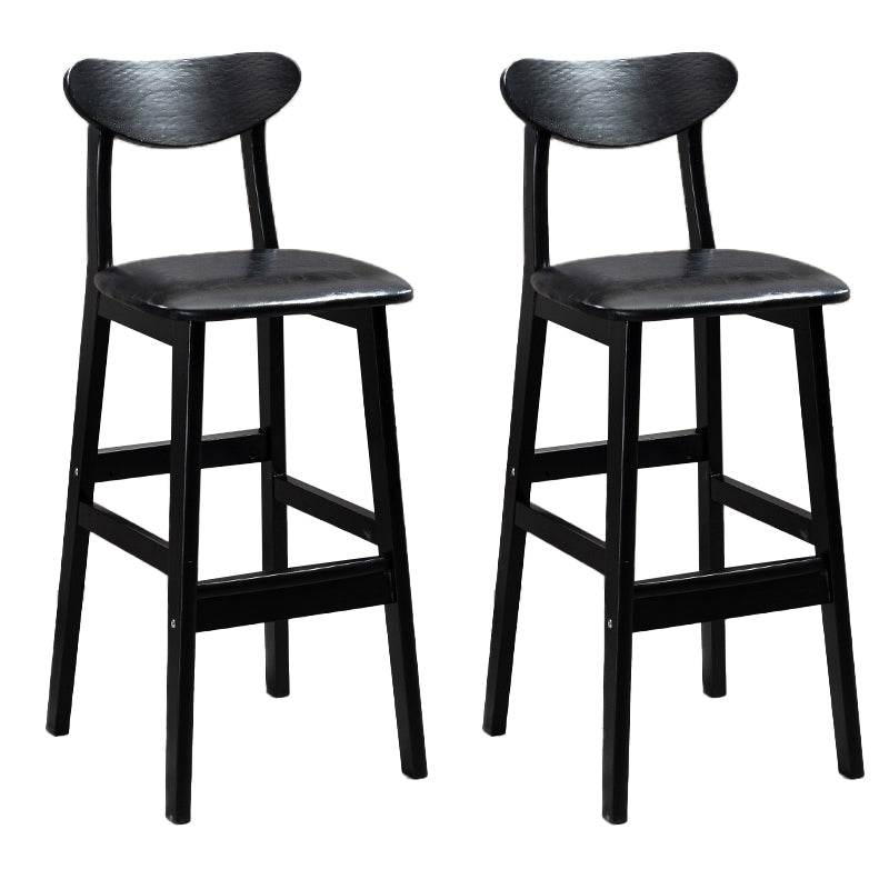 Sgabelli da bar imbottiti da bar in legno solido industriale con gambe nere