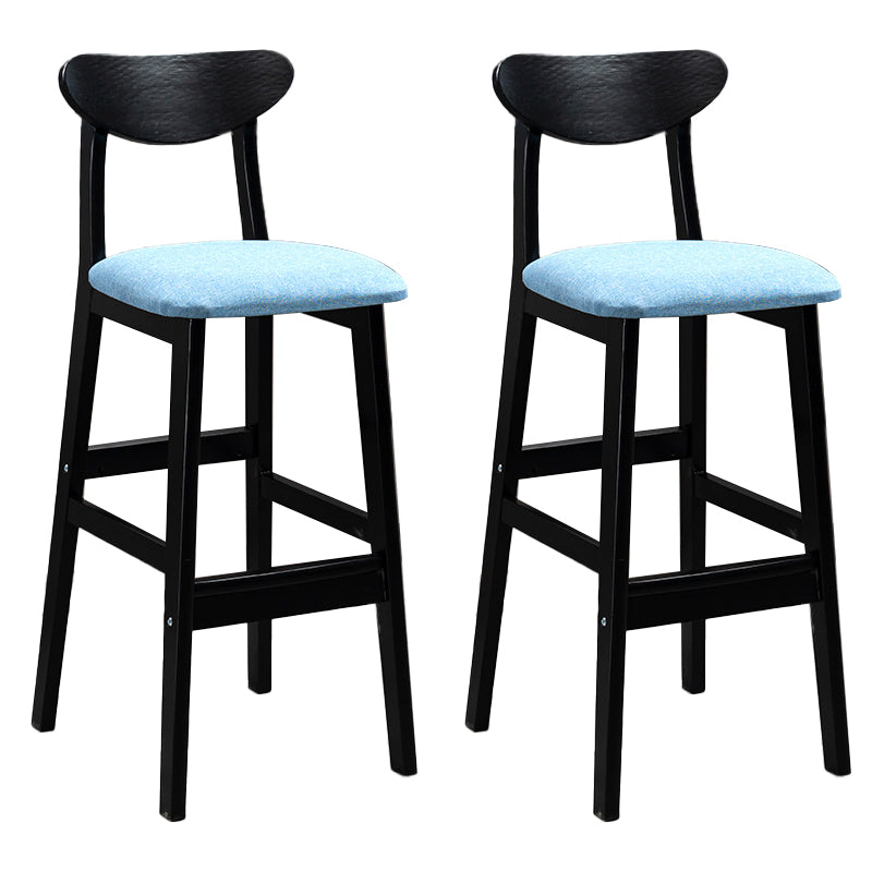 Sgabelli da bar imbottiti da bar in legno solido industriale con gambe nere