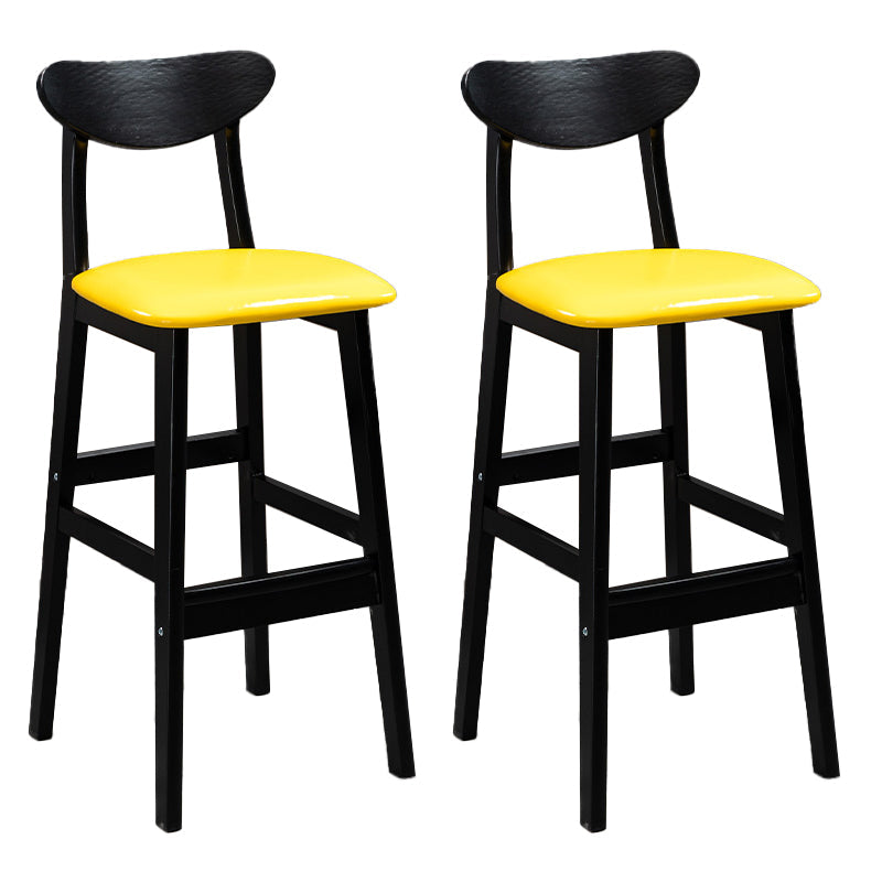 Sgabelli da bar imbottiti da bar in legno solido industriale con gambe nere