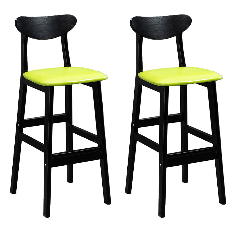 Sgabelli da bar imbottiti da bar in legno solido industriale con gambe nere