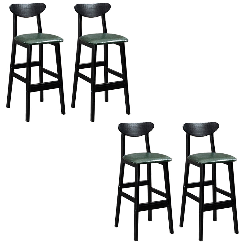 Sgabelli da bar imbottiti da bar in legno solido industriale con gambe nere