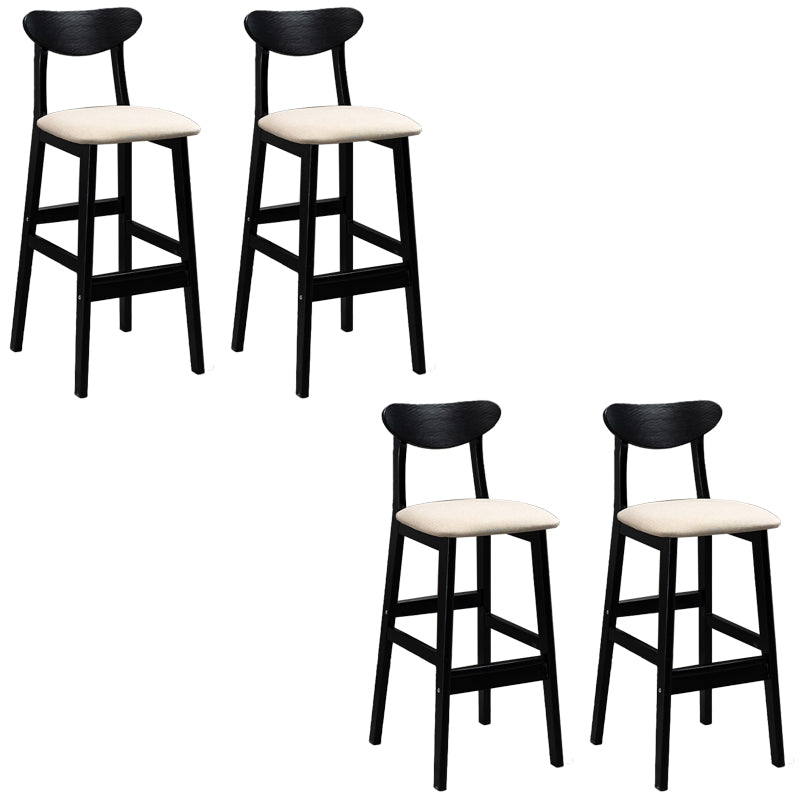 Sgabelli da bar imbottiti da bar in legno solido industriale con gambe nere