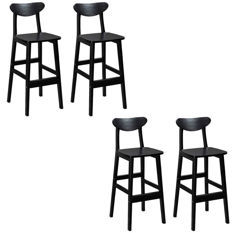 Sgabelli da bar imbottiti da bar in legno solido industriale con gambe nere