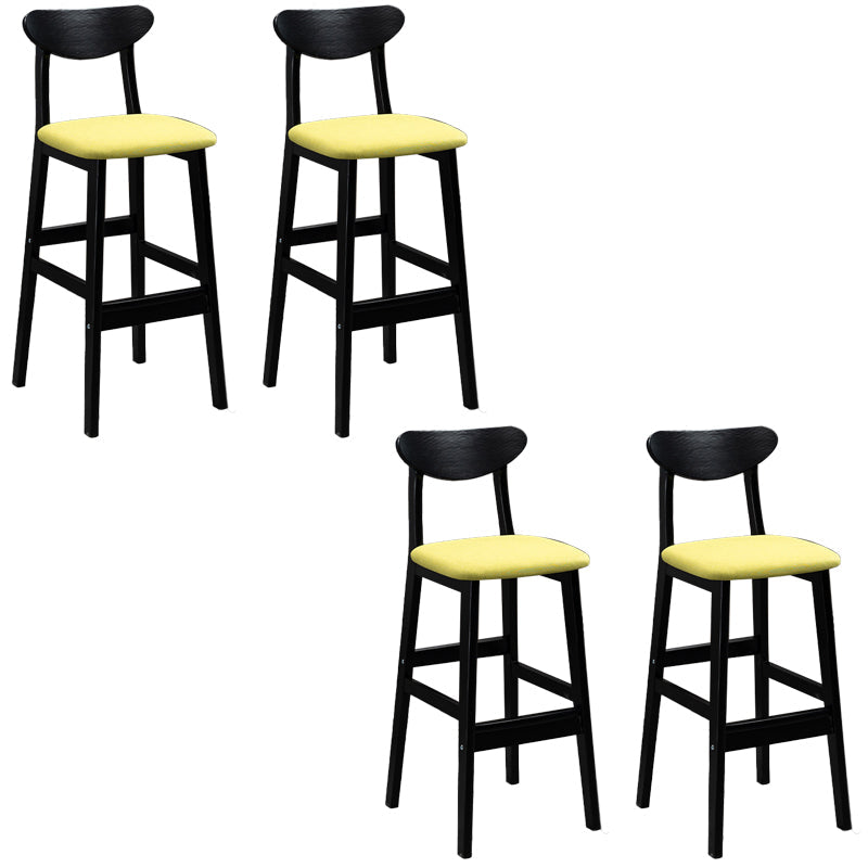 Sgabelli da bar imbottiti da bar in legno solido industriale con gambe nere