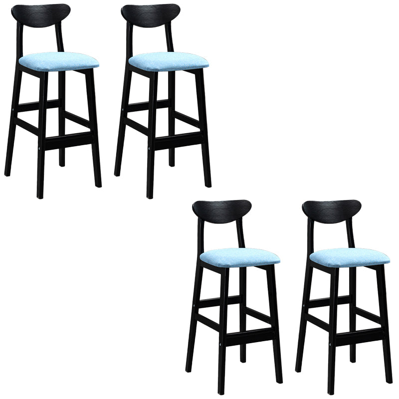 Sgabelli da bar imbottiti da bar in legno solido industriale con gambe nere