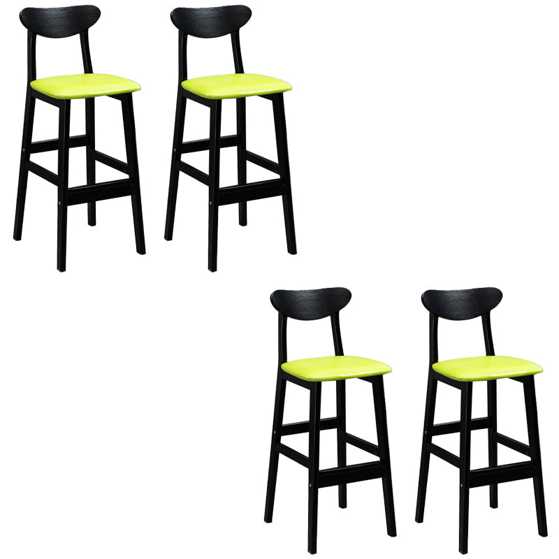 Sgabelli da bar imbottiti da bar in legno solido industriale con gambe nere