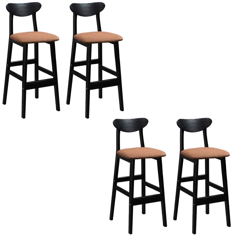 Sgabelli da bar imbottiti da bar in legno solido industriale con gambe nere