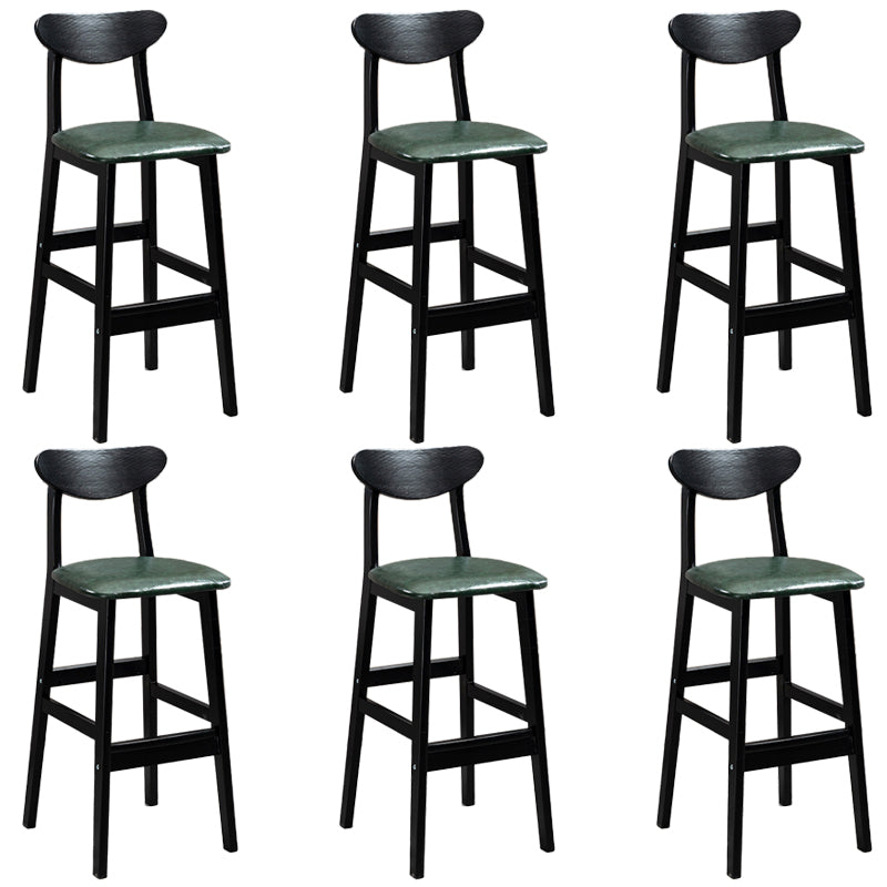 Sgabelli da bar imbottiti da bar in legno solido industriale con gambe nere