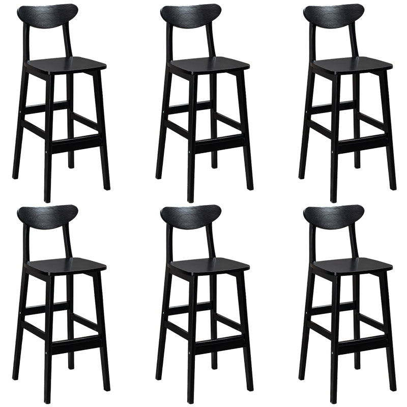 Sgabelli da bar imbottiti da bar in legno solido industriale con gambe nere