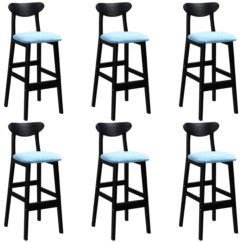 Sgabelli da bar imbottiti da bar in legno solido industriale con gambe nere