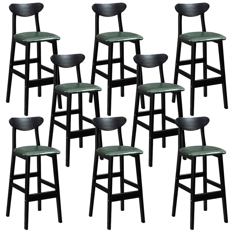 Sgabelli da bar imbottiti da bar in legno solido industriale con gambe nere