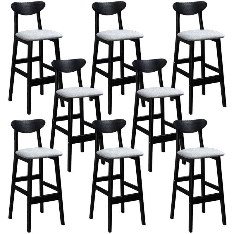 Sgabelli da bar imbottiti da bar in legno solido industriale con gambe nere