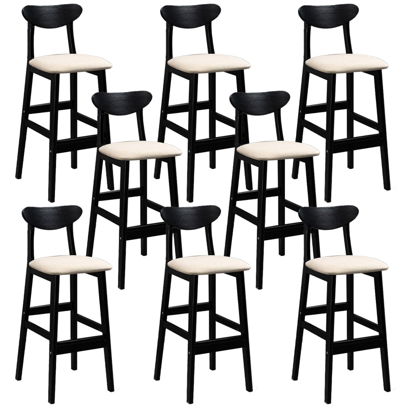 Sgabelli da bar imbottiti da bar in legno solido industriale con gambe nere