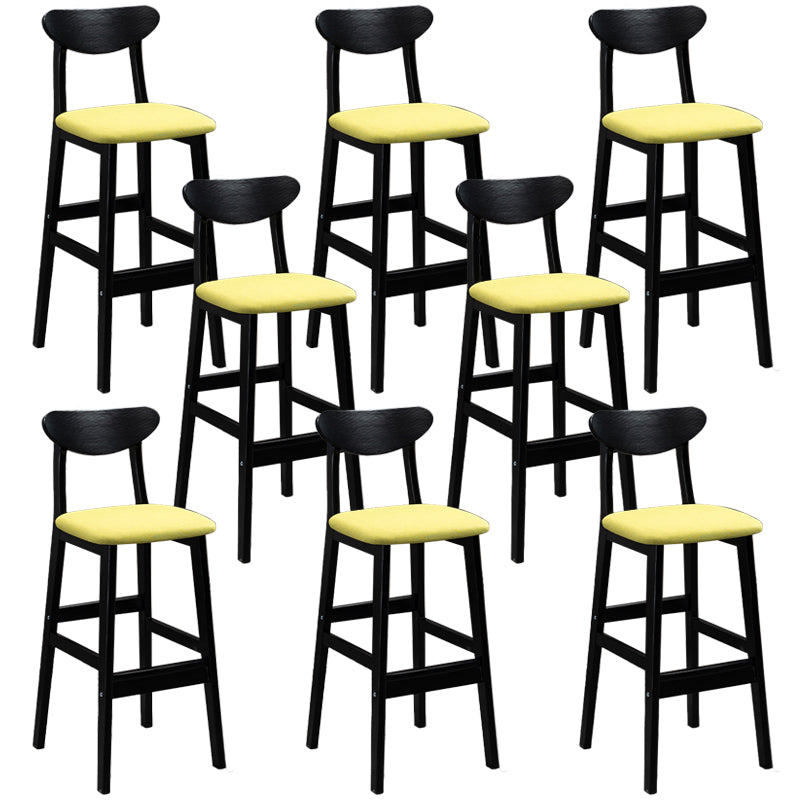 Sgabelli da bar imbottiti da bar in legno solido industriale con gambe nere