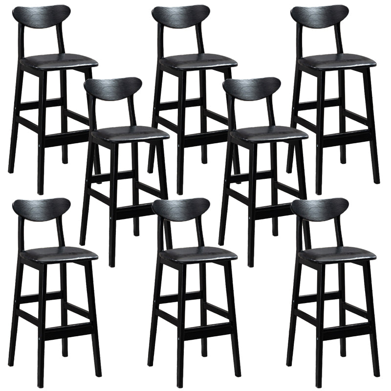 Sgabelli da bar imbottiti da bar in legno solido industriale con gambe nere