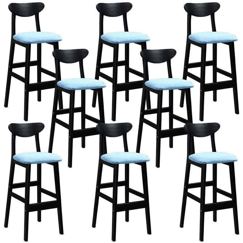 Sgabelli da bar imbottiti da bar in legno solido industriale con gambe nere