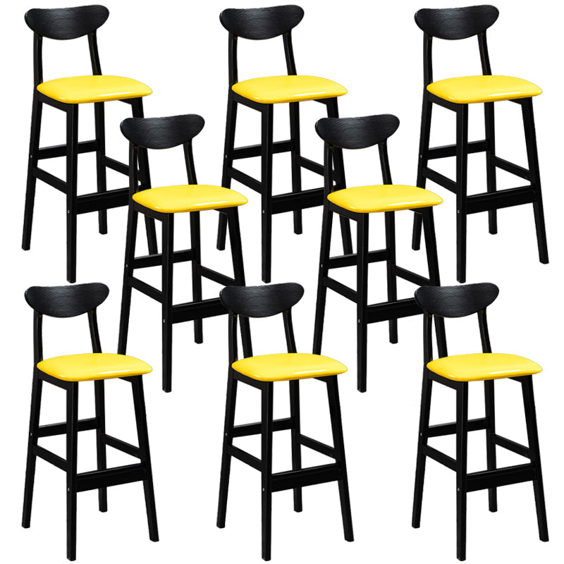 Sgabelli da bar imbottiti da bar in legno solido industriale con gambe nere