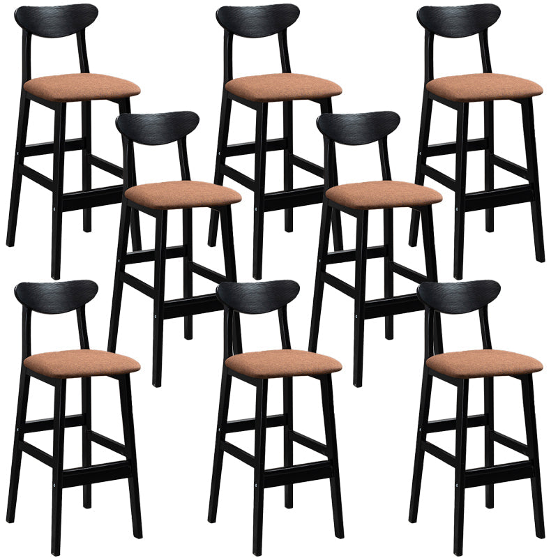 Sgabelli da bar imbottiti da bar in legno solido industriale con gambe nere