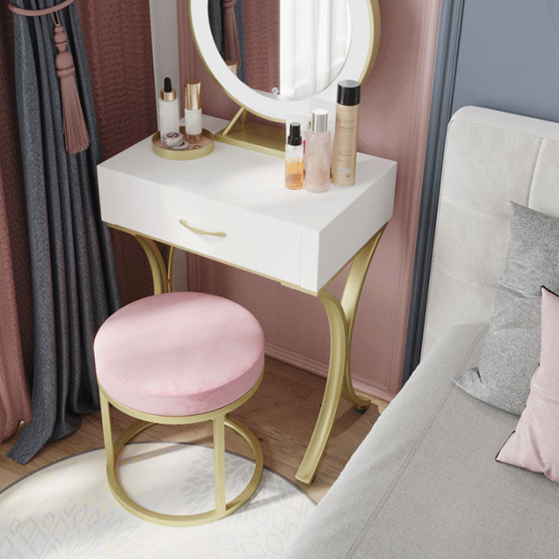 Lussuoso ottomano in velluto resistente al pouttomano rotondo di colore solido imbottito con gambe metalliche