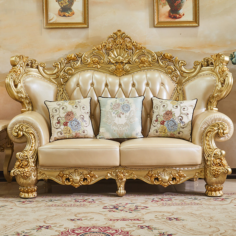 ゴールドの本革ソファ房式スプリットバックロールアームソファリビングルーム用