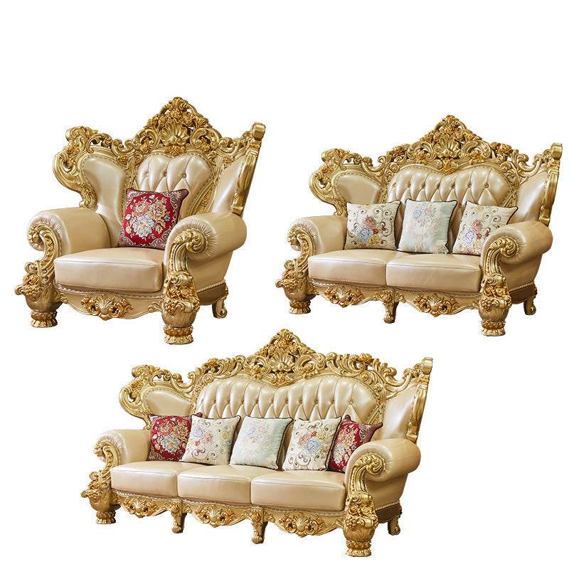 ゴールドの本革ソファ房式スプリットバックロールアームソファリビングルーム用