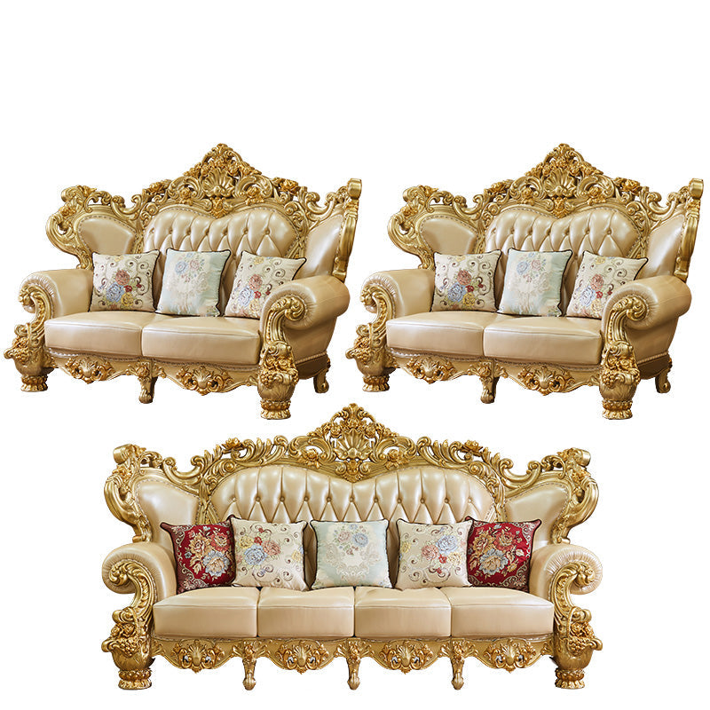 ゴールドの本革ソファ房式スプリットバックロールアームソファリビングルーム用