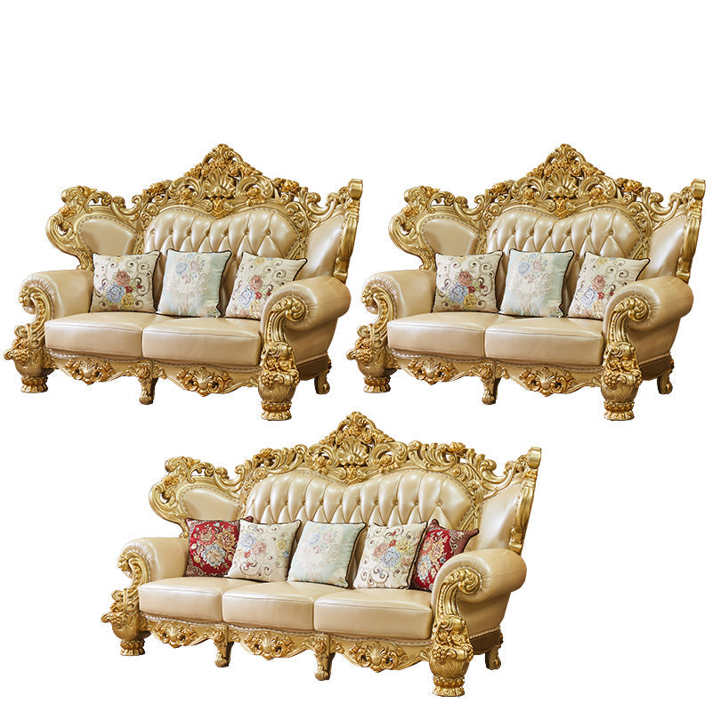 ゴールドの本革ソファ房式スプリットバックロールアームソファリビングルーム用