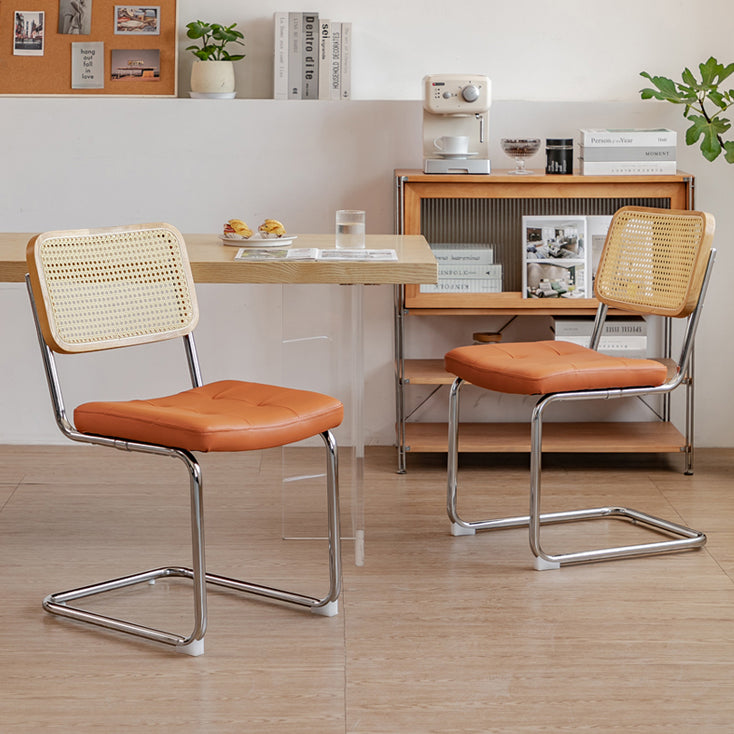 Silla lateral tapizada silla de brazo trasero de estilo moderno con base cromada